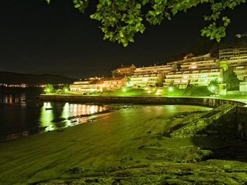 Hotel Corcubion Playa De Quenxe Bagian luar foto