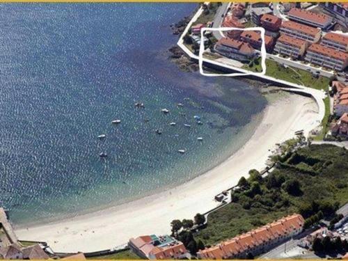Hotel Corcubion Playa De Quenxe Bagian luar foto